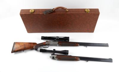 Doppelkugel mit Bockbüchsflintenwechsellauf, Johann Michelitsch-Ferlach, Mod.: 1970 mit patentiertem Zerlegemechanismus im Lederkoffer, Kal.: 9,3 x 74R/9,3 x 74R, WL mit 20/76/6 mm Rem., - Sporting & Vintage Guns