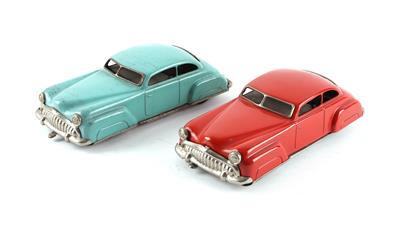 2 Stk. Distler Limousinen (Cadillacs), um 1950. - Toys