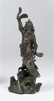 A bronze figure of a Daoist immortal with a crane - Asian art
