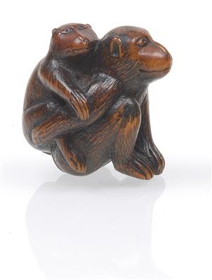 A wooden netsuke of a monkey with its young - Asian art