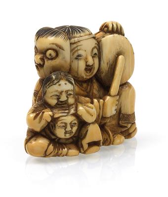 An ivory netsuke of a drummer with an usofuki mask and two children listening - Asian art