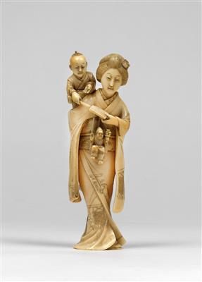 An ivory Okimono of a woman with karako and doll - Asian art