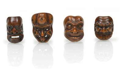 Four wooden mask netsukes, - Asian art