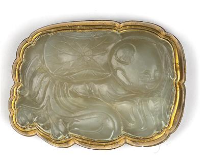 A belt buckle - Asian art