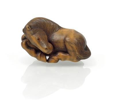 A netsuke of a recumbent horse, Japan, Meiji period - Asian art