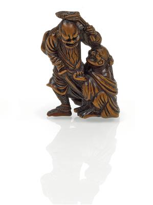 A netsuke depicting two men wrestling, Japan, 19th cent. - Asian art