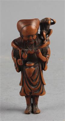 Netsuke eines sarumawashi mit einem Affen, - Starožitnosti