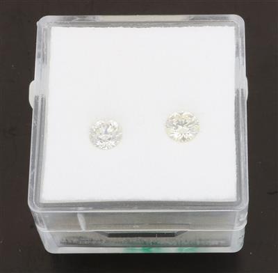 2 lose Brillanten zus.0,66 ct J-M/si-p1 - Diamonds Only