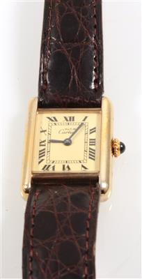 Cartier Tank - Schmuck - Uhrenschwerpunkt