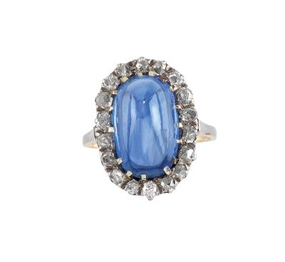 A diamond and sapphire ring - Klenoty
