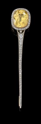 A diamond brooch with untreated, yellow sapphire c. 11.20 ct - Jewellery