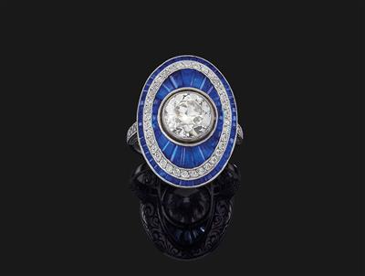 A diamond and sapphire ring - Klenoty