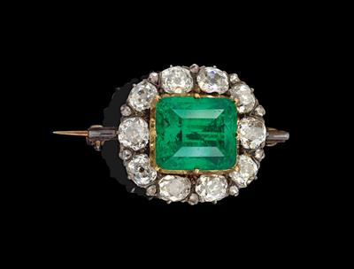 A diamond and emerald brooch - Klenoty