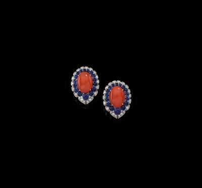 A pair of coral and sapphire ear clips by Rinaldi - Gioielli