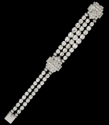 A diamond bracelet by Cartier London, total weight c. 30 ct - Šperky